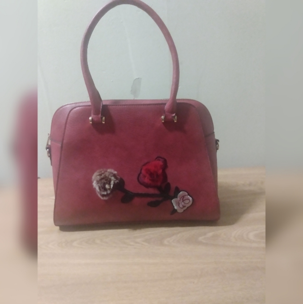 Red handbag with long strap